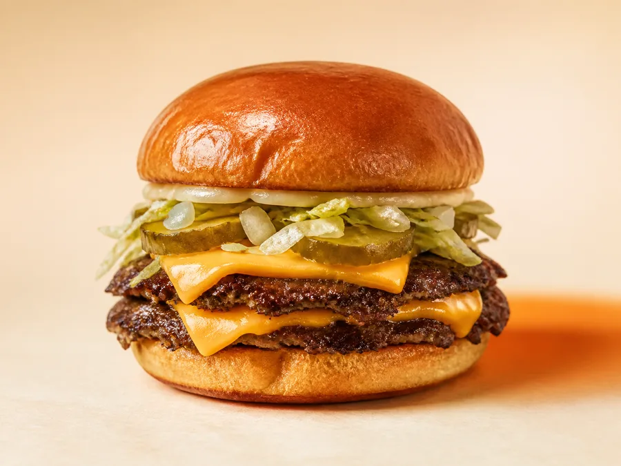 Double burger with cheddar, pickles and lettuce